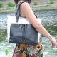 Женская кожаная сумка с карманами белая с черным